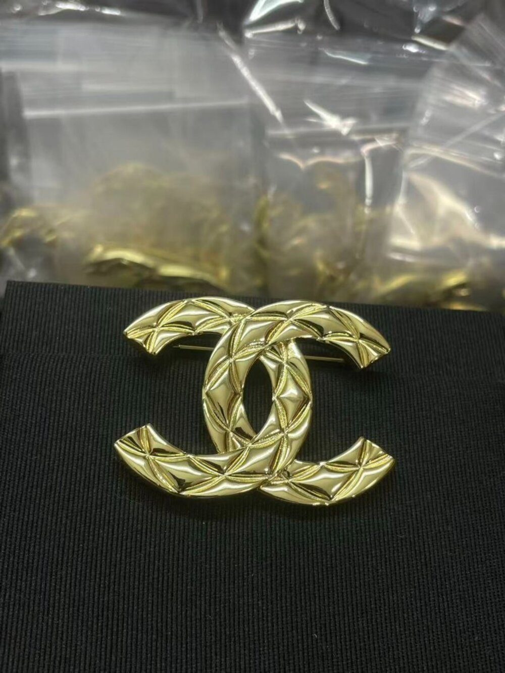 Chanel Quilted Gold-Tone CC Logo Brooch